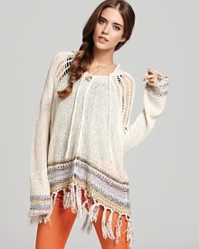 Kick back in this loose-knit Vintage Havana sweater, flaunting a bohemian-chic beaded fringe hem.