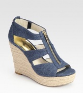 Comfy denim classic with an espadrille wedge and exposed front zipper. Hemp wedge, 4 (100mm)Hemp platform, 1 (25mm)Compares to a 3 heel (75mm)Denim upperLeather liningRubber solePadded insoleImported