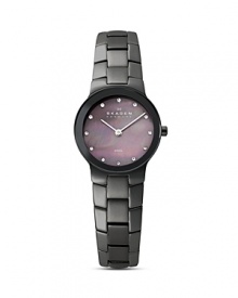 Forward thinking style from Skagen: A beautiful dial with crystal markers, and a classic link band in dark gray.