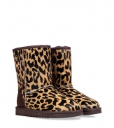 With a cool cheetah print and undeniably cozy interior, these haircalf boots from UGG Australia lend comfort and style to your cold weather look - Round toe, dark brown rubber sole, exposed seams, side button detail, contrasting back counter suede panel, cozy shearling lining - Hits above the ankle - Pair with favorite jeans, bright knits, and sporty outerwear