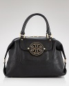 Tory Burch's leather satchel bag is the daytime bag on every label lover's list. On weekends, this bag slips on the arm with a bold coat to lend a practical dose of chic.