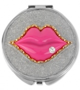 Lip service. Betsey Johnson's compact, crafted from silver-tone mixed metal, glistens with small crystal accents and is quite whimsical. Item comes packaged in a signature Betsey Johnson Gift Box. Approximate length: 3 inches. Approximate width: 3 inches.