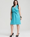 Trend-right color blocking makes a summer statement in Tahari Woman's flattering faux wrap dress.