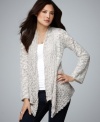 This petite cardigan by Style&co. mingles pointelle and burnout details to create a gorgeous texture. The draped fit of the asymmetrical hem makes a stylish statement, even when paired with your everyday denim.