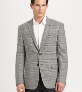 A smartly checked houndstooth pattern dresses up this impeccably tailored piece.Notched lapelButton frontFlap pocketsButton cuffsFully linedAbout 31 from shoulder to hem98% wool/2% lycraDry cleanImported