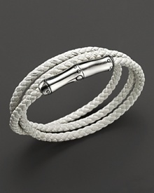 Snow-white leather is adorned with a bamboo sterling silver ornament, which cleverly hides a magnetic clasp.