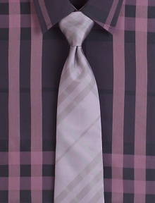 The iconic check pattern is rendered with tonal color in gently woven silk.Mulberry silkDry cleanMade in Italy