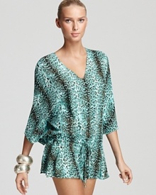 Take this season's animal print trend poolside with this printed cover up from ViX. In a bold spot-splashed pattern, this piece hints at your wild side.