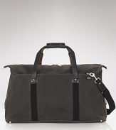 A handsome travel companion, this soft duffle makes toting your essentials a stylish affair.