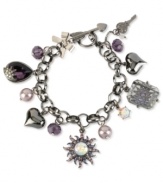 Rise and shine with this multi-charm bracelet from Betsey Johnson. Crafted from hematite-tone mixed metal, the bracelet dazzles with charms adorned with colorful glass crystal accents and faceted beads. Approximate length: 7-1/2 inches.