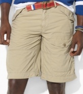 A button-flap cargo pocket at the leg lends rugged appeal to a preppy short in comfortable cotton poplin.