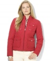 Lauren Ralph Lauren's plus size lightweight barn jacket boasts an elegant quilted silhouette and is finished with a mockneck collar and chic hardware for a classic cold-weather look.