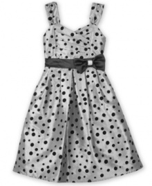 Lovely satin dot dress by BCX comes with a sparkling bow belt.  Complement this dress with a shawl or shrug.