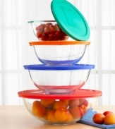 Perfect for virtually every kitchen task - cooking, serving and storage - this set of four covered bowls can go from the freezer to the oven or microwave and straight to the dinner table. Made of durable, impact resistant Pyrex with colorful, tight-fitting lids that lock in freshness. Easy to clean. Two-year warranty.