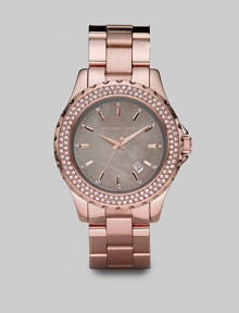 Add sparkle with a crystal bezel and a gray mother-of-pearl dial. Quartz movement Water-resistant to 10ATM Round rose goldplated stainless steel case, 42mm (1.65) Gray mother-of-pearl dial Index hour markers Date display between 4 and 5 o'clock Second hand Rose goldplated stainless steel link bracelet Imported 