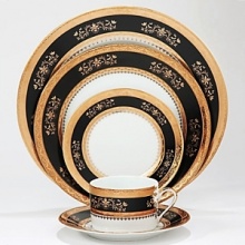 The Orsay Black/Gold tea saucers by Philippe Deshoulieres features a delicate gold pattern set against a black background that subtly references Limoges. Inspired by the famous 19th century Parisian train station on the banks of the Seine, this collection is sure to add old world romance to your table setting.