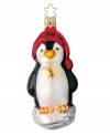 Inge-Glas of Germany has been producing mouth-blown, handcrafted glass ornaments for over 400 years. This charming penguin Santa ornament showcases the generations-old craftsmanship that still thrives today.