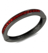 Wrist watching will be the order of the day with this bracelet from Kenneth Cole New York. Crafted from hematite-tone mixed metal and adorned with red glass crystal accents, the bracelet will make sure all eyes are on you. Approximate diameter: 2-1/4 inches.