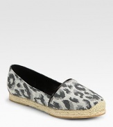 Leopard-print canvas with leather trim and a slight espadrille-inspired platform. Canvas upperLeather liningRubber solePadded insoleImportedOUR FIT MODEL RECOMMENDS ordering true size. 