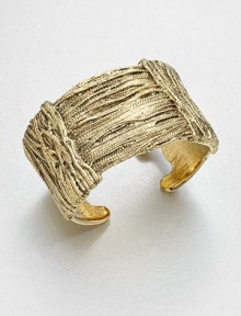 Simply stunning, this richly textured open cuff is formed of wrapped golden ropes for endless gleam and glamour.GoldplatedDiameter, about 2.7Width, about 1.6Made in France