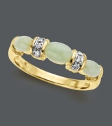 The perfect combination of pale pastel and a little sparkle, too. This unique design features three jade stones (5 mm x 3 mm and 6 mm x 4 mm) separated by round-cut rows of diamond accents. Ring set in 14k gold.