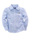 A preppy shirt in crisp cotton oxford is designed with stylish ruffles for a girlie look.