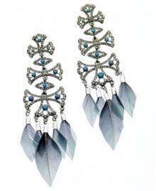 Calling all trendsetters, feathers are totally fab! GUESS's dazzling style combines a multi-cross design with blue crystals, turquoise-colored beads and of course, feathers! Set in silver tone mixed metal. Approximate drop: 2 inches.