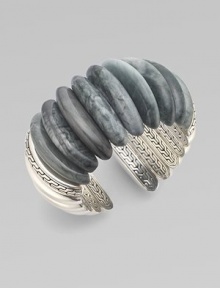 This exceptional cuff design circles the wrist with agate stones and sterling silver.Agate Sterling silver Width, about 1½Diameter, about 2Made in Bali