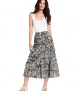 Style&co.'s skirt effortlessly balances elements that are daring and feminine, mixing animal and lace prints on a tiered A-line silhouette. Tuck in a tank and your outfit is complete!