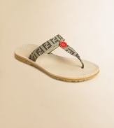 Accented by designer logos, these chic t-strap sandals are on every girl's most-wanted list.Slip-onCanvas upperRubber soleLogo pendantImportedAdditional InformationKid's Shoe Size Guide (European Equivalent) 