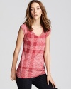 This bright Burberry Brit tee flaunts the brand's signature check print in a cheery coral hue for the ultimate in casual-cool.