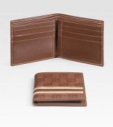 Signature guccissima leather with six card slots and two bill compartments. Fabric web detail 3¾ X 4¼ Made in Italy 