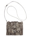 This unique crossbody design is sure to keep you organized, no matter how chaotic your day gets! A take-anywhere design by Nine West, featuring an ultra organized interior and easy-wear crossbody silhouette.