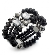 Crystal clear fashion with an edge, by Bar III. This stretch bracelet brings together jet black plastic beads with clear acrylic stones. Stretches to fit wrist. Crafted in hematite tone mixed metal. Approximate diameter: 2-1/2 inches.