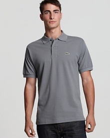 A clean-cut cotton polo with tonal embroidery at the left chest.