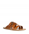 Add luxe style to your casual beach-ready look with these leather sandals from D&G Dolce & Gabbana -Crisscross-detailed straps, buckle detail, leather sole, contrast stitching - Pair with shorts and a breezy button down for casual-cool