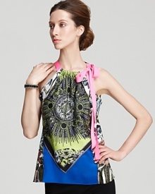 Embark on a quest to eclectic-chic with this Elie Tahari blouse, flaunting a vibrant cascade of print finished with an alluring neon neckline.