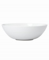 Dine with Wickford dinnerware and tie in timeless sophistication with every meal. This versatile white porcelain serving bowl has a contemporary shape embossed with a twisting rope design.