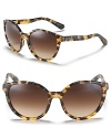 Glam it up in these rounded vintage-inspired frames by Miu Miu.