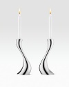 German designer Constantin Wortmann's curvaceous candlesticks are aptly named as they undulate elegantly into serpentine arcs.From the Cobra Collection Fits standard taper candles Candle not included 7¾H Stainless steel Dishwasher safe Imported