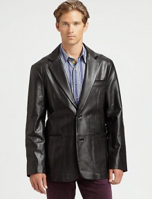 A classic silhouette makes a handsome first impression, and this tailored jacket is no exception. Structured in lustrous, lambskin leather with expert stitch detail across the body.Button-frontNotch lapelChest, waist welt pocketsRear ventAbout 31 from shoulder to hemLeatherDry cleanImported