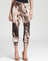 A painterly print infuses these comfy-chic GUESS pants with an artistic spirit.