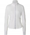 Inject a modern edge into your sportswear wardrobe with Jet Sets sleek stretch zip-up jacket, the perfect weight for wearing both indoors and out - Stand-up collar, long sleeves, zippered front, zippered pockets - Form-fitting - Team with weather boots and jeans, or with workout leggings and fashion sneakers