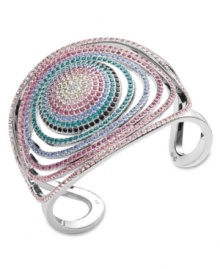 Brighten up your summer outfits or make a statement on the dance floor! Swarovski's chic bangle glows in a hypnotic rainbow of crystal colors. Crafted in palladium-plated mixed metal with an open-work pattern. Approximate diameter: 2-1/8 inches.