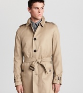 A single breasted silhouette lends a clean, timeless look to a classic Burberry trench.