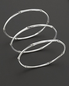 From the Bamboo collection, a set of 3 bamboo-inspired bangles, designed by John Hardy.