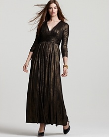 Shimmer from shoulder to toe in this knockout David Meister Plus metallic gown.