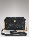 Introduce a chic hit of color into your wardrobe with this quilted leather mini bag from Marc Jacobs. This bold piece perfectly showcases the label's cool while it enlivens an evening look.