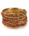 Layer on these goldtone, wood and multicolored beaded bangles for color, shine and a subtle bit of noise.