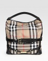 A perfect slouchy shape for all of your essential items, crafted in the classic canvas Burberry check with sleek leather trim. Leather top handle, 3 dropDetachable leather shoulder strap, 9½ dropOne inside zip compartmentOne inside zip pocketCotton lining10W X 12H X 5DMade in Italy